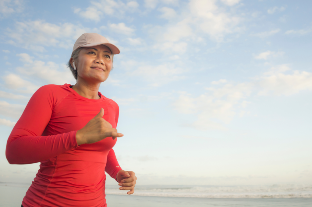 Rubedo Life Sciences and Longevity woman running on beach.